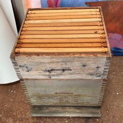 A commercial wooden bee hive