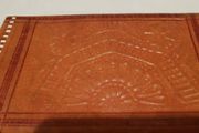 handcrafted made soft leather wallet,with designs ,, thank you,,was used,some wear and tear,,take as is ..