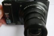 Nikon COOLPIX S9100 Digital Camera 12.1 MP 18x Optical Zoom Built-in Flash + 8 Gb SD Card and charger