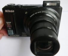 Nikon COOLPIX S9100 Digital Camera 12.1 MP 18x Optical Zoom Built-in Flash + 8 Gb SD Card and charger