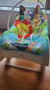 Fisher Price 2-in-1 baby rocker and toddler seat with hanging toys