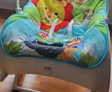 Fisher Price 2-in-1 baby rocker and toddler seat with hanging toys