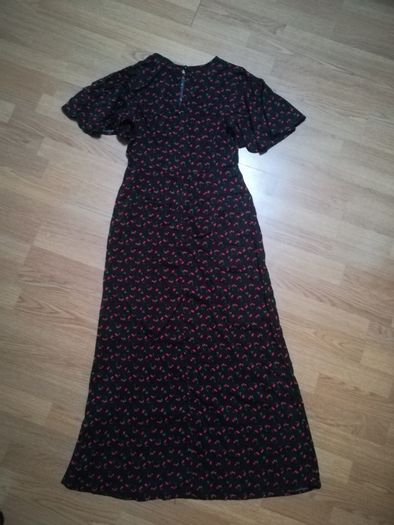 Never worn beautiful dress with a slit