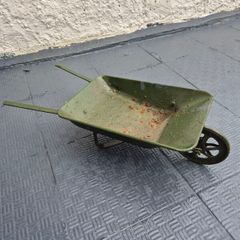 Vintage minature metal wheelbarrow