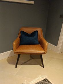 Faux leather armchair