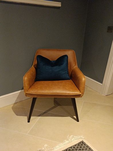Faux leather armchair