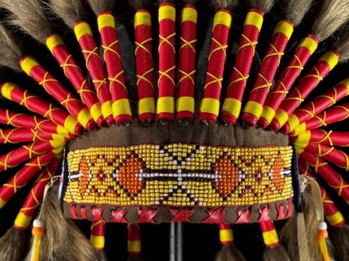 Large handmade Indian headdress on custom stand