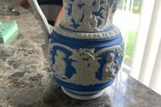 Four seasons Parian jug