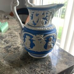 Four seasons Parian jug