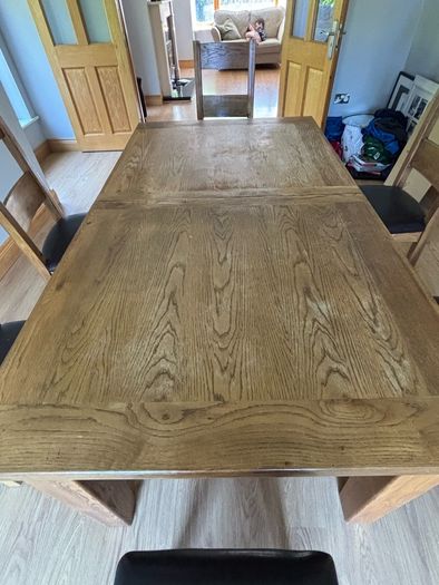Extendable dining table and chair set for sale