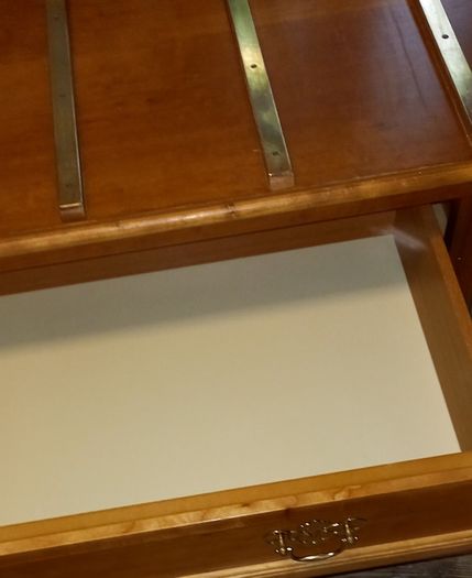 Chest with suitcase set down on top