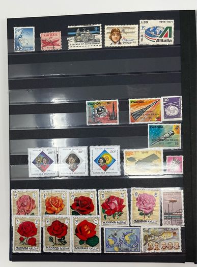 Ace Black 32 page/ 16 leaf Stamp Album with over 900 stamps. Thematic of Animals, Plants, Classic Cars, Space, Trains, Sport & Disney noted.