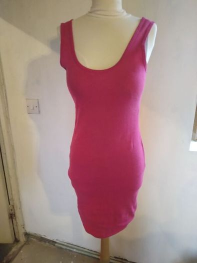 Stretch Dress,figure hugging.Size 12 Brand New.