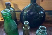 5 Vintage green glass bottles