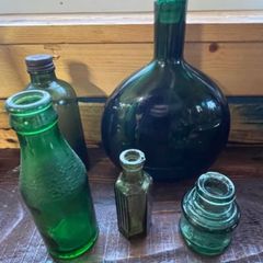 5 Vintage green glass bottles