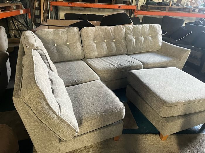 Grey corner sofa with matching footstool