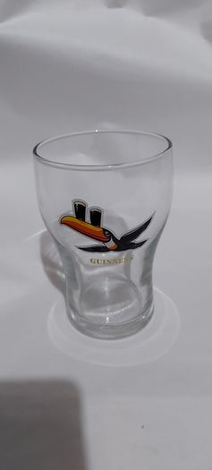 guinness glass with toucan,see pictures for condition good,,