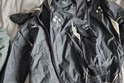 Two rugby boys raincoats