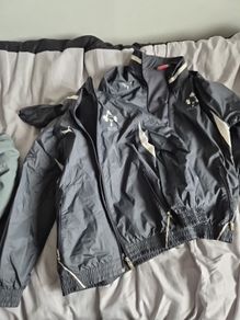 Two rugby boys raincoats