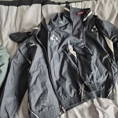 Two rugby boys raincoats