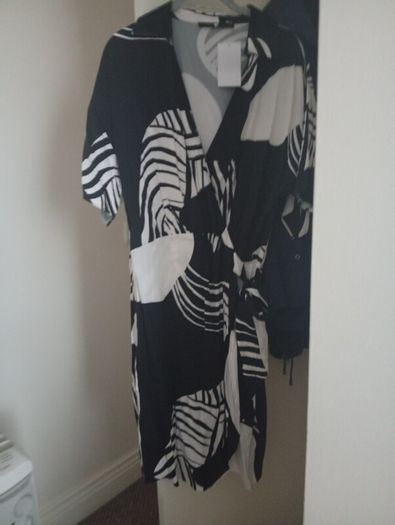 New Dress with tags very nice and dressy.