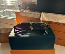 Lv glasses/shades purple tint