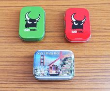 3 small tin boxes
