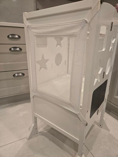 White wooden toddler learning tower