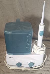 electric dental irrigator - dental flosser