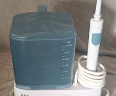 electric dental irrigator - dental flosser