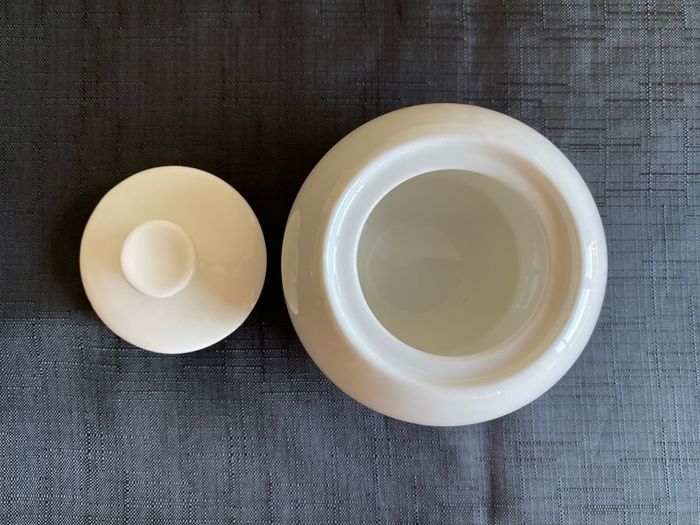 White ceramic sugar pot with lid in perfect condition