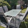 garden table with 6 chairs including cushions which are in perfect condition Image 2