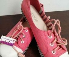 Escape. Orange canvas shoes, new with tags.