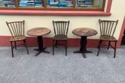 Sturdy Old Irish Country Chairs and two Vintage Round Tables suitable for cottage/pub