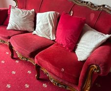 Red fabric sofa , wood finish