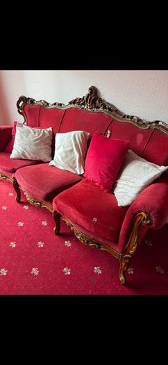 Red fabric sofa , wood finish