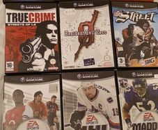 Nintendo GameCube. Controllers x2. Memory card x2. Games x9.