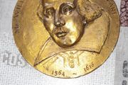 Bronze Coloured Wall Plaque of William Shakespeare with his Name and birth 1564 and death 1616 embossed on the front, Postage Available or Collection