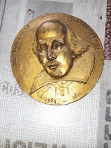 Bronze Coloured Wall Plaque of William Shakespeare with his Name and birth 1564 and death 1616 embossed on the front, Postage Available or Collection