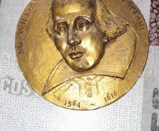 Bronze Coloured Wall Plaque of William Shakespeare with his Name and birth 1564 and death 1616 embossed on the front, Postage Available or Collection