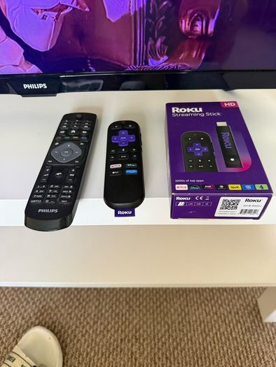 TV with Roku and Console Table