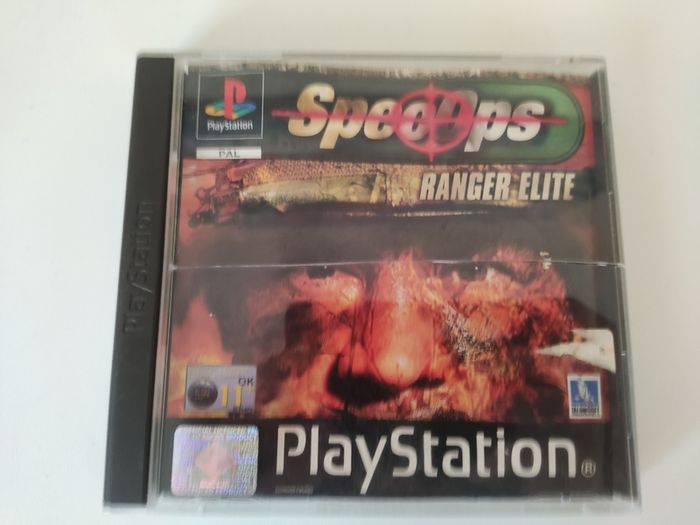 Playstation 1 console SCPH-7502 with games and cords