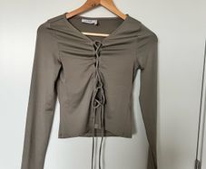 The lacing long sleeve top