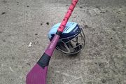 hurling helmet and hurl