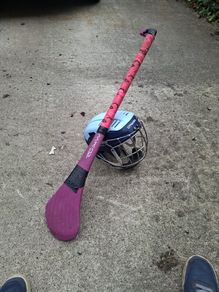 hurling helmet and hurl