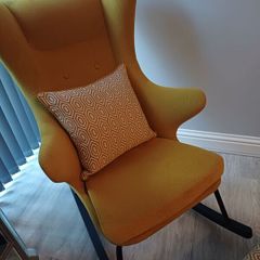 Rocking accent chair designer Kare with matching foot stool