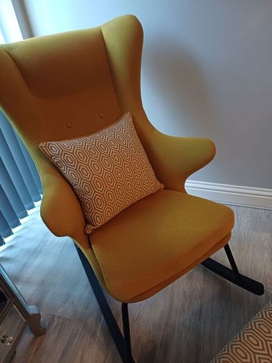 Rocking accent chair designer Kare with matching foot stool