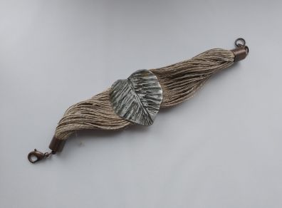 Handmade string bracelet in raw style. Leaf