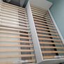 White single bed with underneath pull out bed and 2 storage draws Image 7