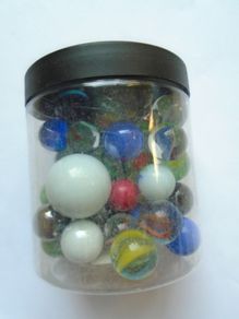 Jar of assorted marbles, Marbles.